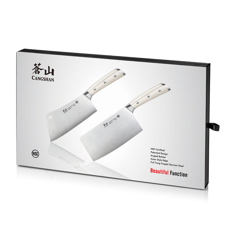 Two cleaver knives with light-colored handles displayed on a white box with black edges and text.