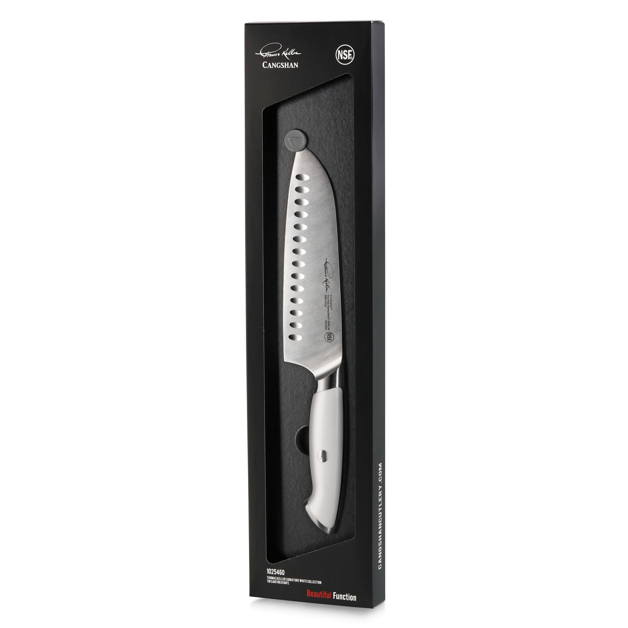 TKSC 7-inch Santoku knife with white handle and perforated blade in black packaging from Thomas Keller Signature Collection.